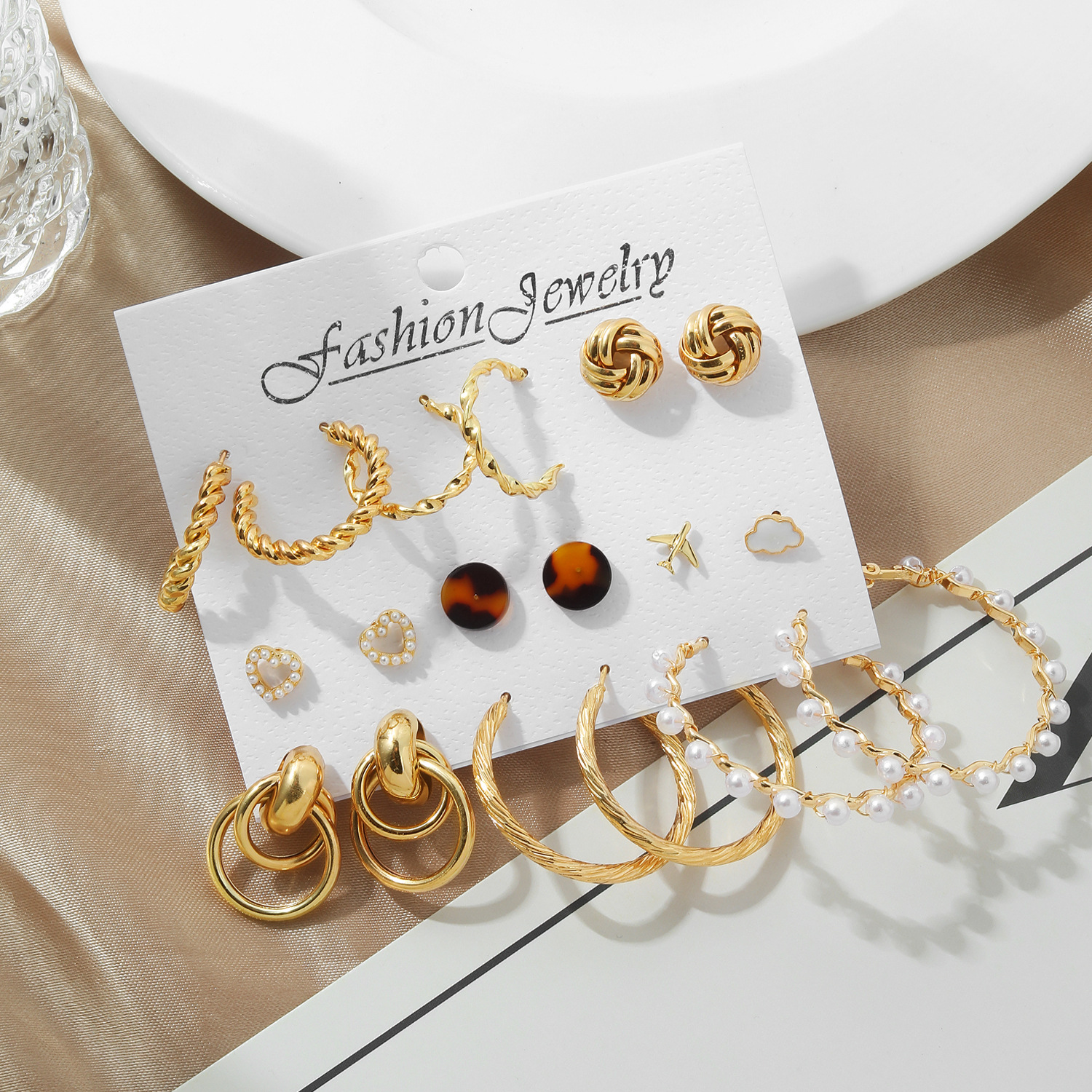 European and American cross-border creative, simple and elegant women's jewelry set, airplane white cloud stud earrings, pearl earrings 9-piece batch Application Scenario