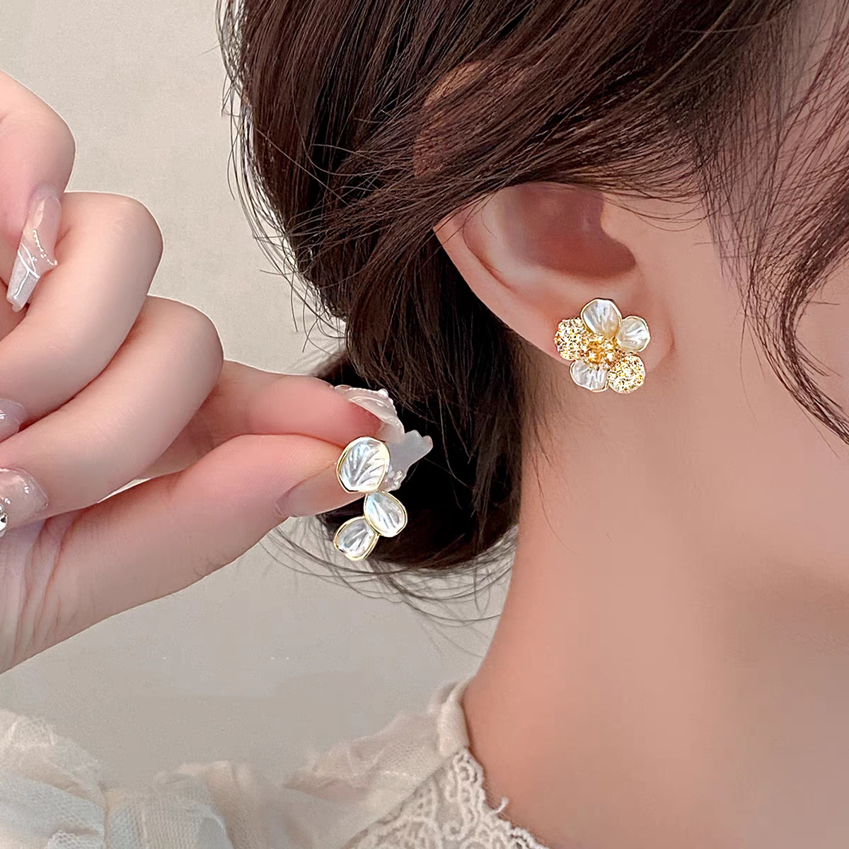 Asymmetrical flower earrings for women in 2025, unique and distinctive design, high-end and elegant, light luxury stud earrings full figure