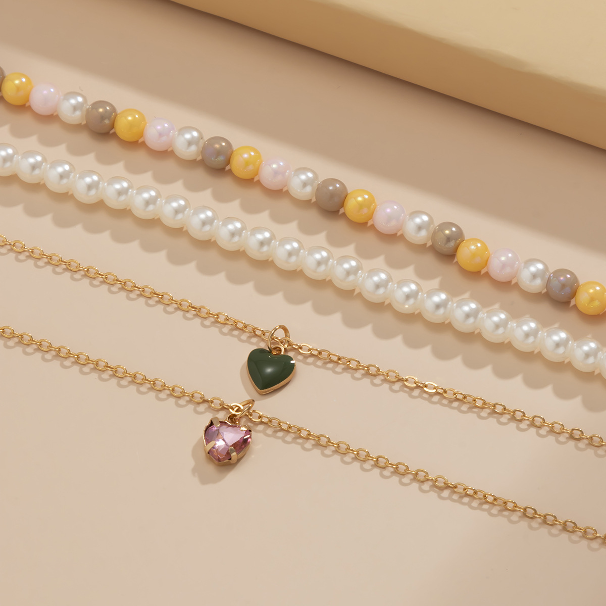 European and American cross-border retro and simple pearl alloy set necklace, personalized tassel oil drip peach heart water diamond neckpiece Specification drawing