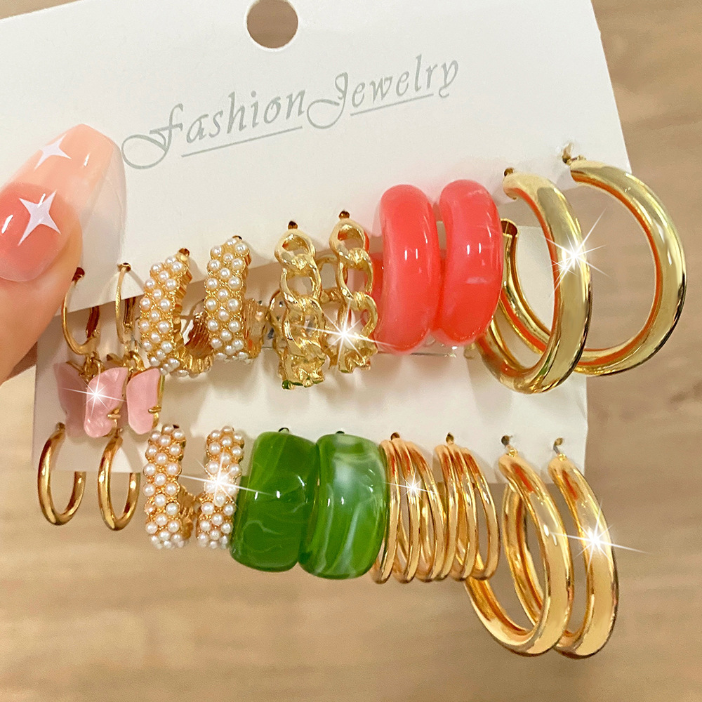 A new cross-border pearl butterfly earrings set of 5 pairs, featuring creative and simple pink acrylic C-shaped chain earrings full figure