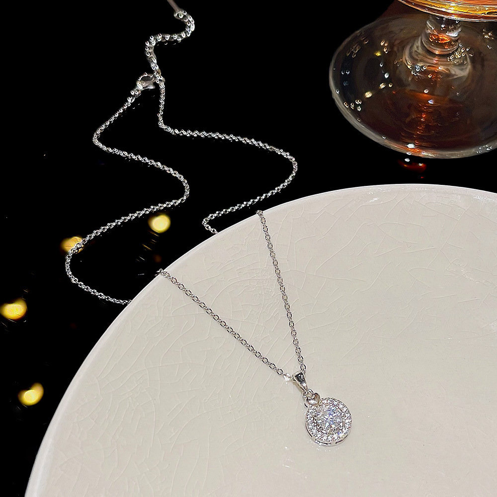 Korean light luxury geometric zircon titanium steel necklace, women's niche super sparkling pendant, sweet and simple collarbone chain wholesale details Picture