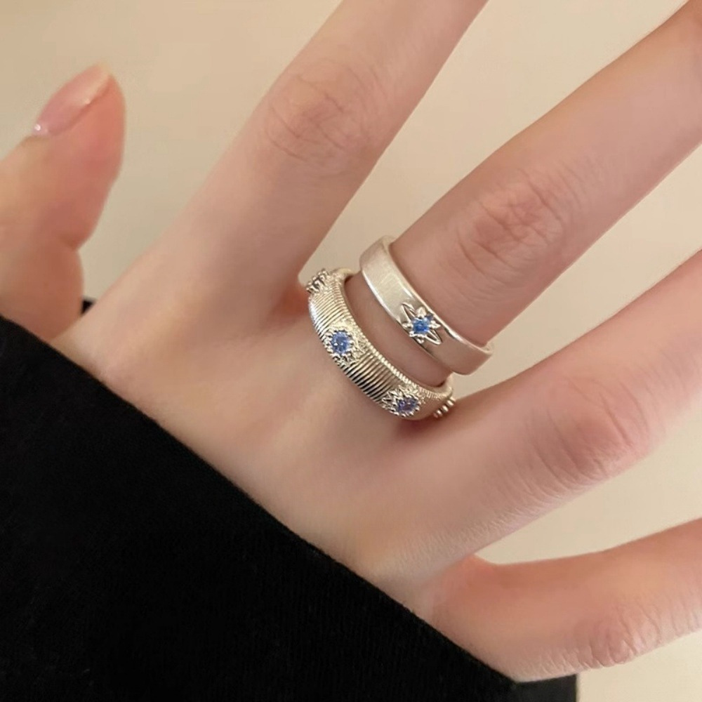 A sea blue zircon cross brushed ring, a niche design for women, is a couple's index finger ring with a light luxury and high-end feel Item Picture