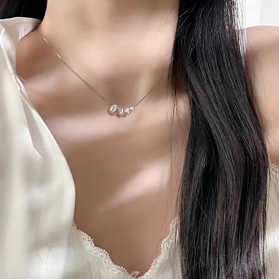 This Korean brushed and frosted ball necklace features a niche design for women, a simple and versatile collarbone chain with a cold style details Picture