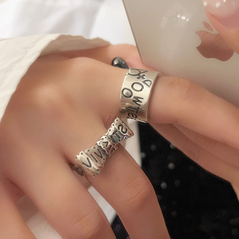 A Western post-punk cold style vintage Saturn mid-style bow skull wide letter ring for a woman Application Scenario