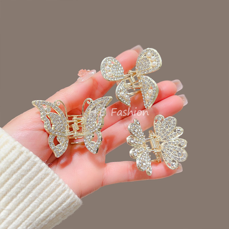 A new elegant hairpin accessory featuring a high-end water diamond butterfly claw clip, a delicate half-tied updo shark clip at the back of a woman's head Specification drawing