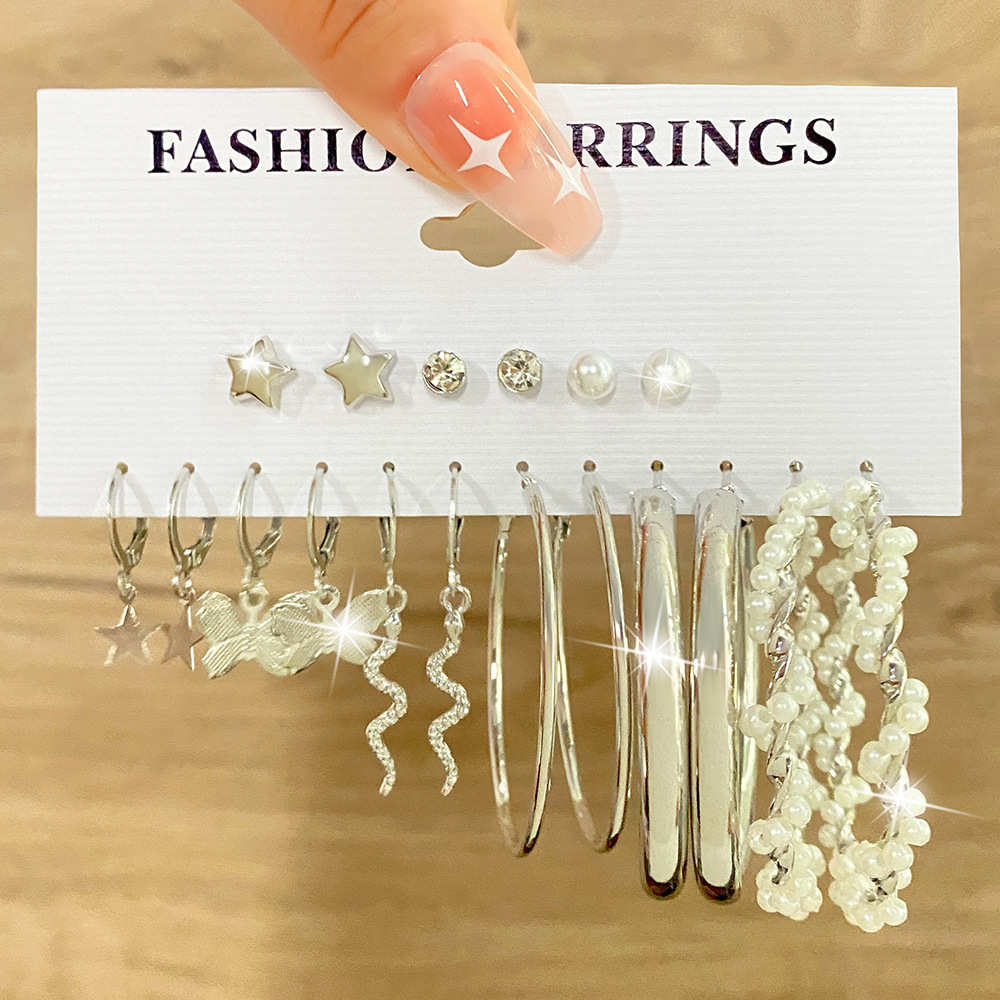 Wholesale of new cross-border silver butterfly pearl earrings, creative and simple five-pointed star moon earrings set of 9 pairs Application Scenario