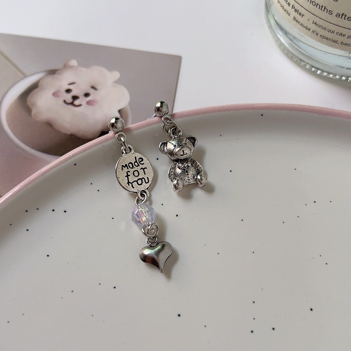 Asymmetrical bear stud earrings for women, with a light luxury and niche design, exude a sense of sophistication. They are fashionable, elegant and sweet earrings for women details Picture