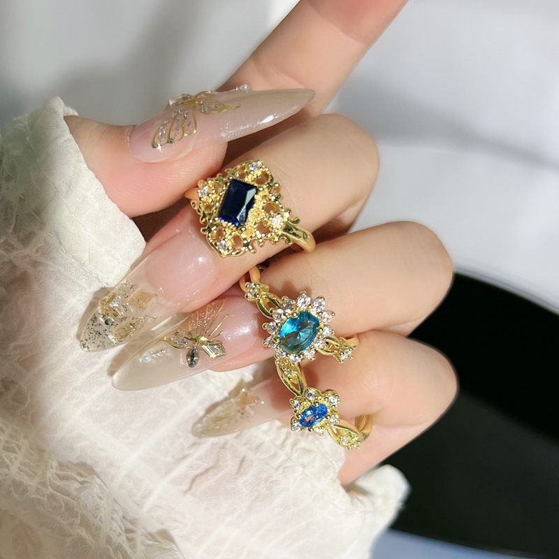 French retro blue lover's exquisite and high-end ring, women's sunflower oval zircon small and versatile index finger ring full figure