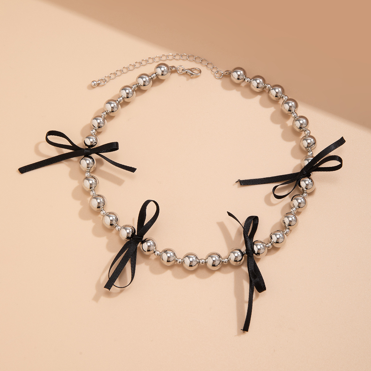 European and American style cross-border bestseller black bow beaded necklace versatile necklace handcrafted sweet necklace accessory Application Scenario
