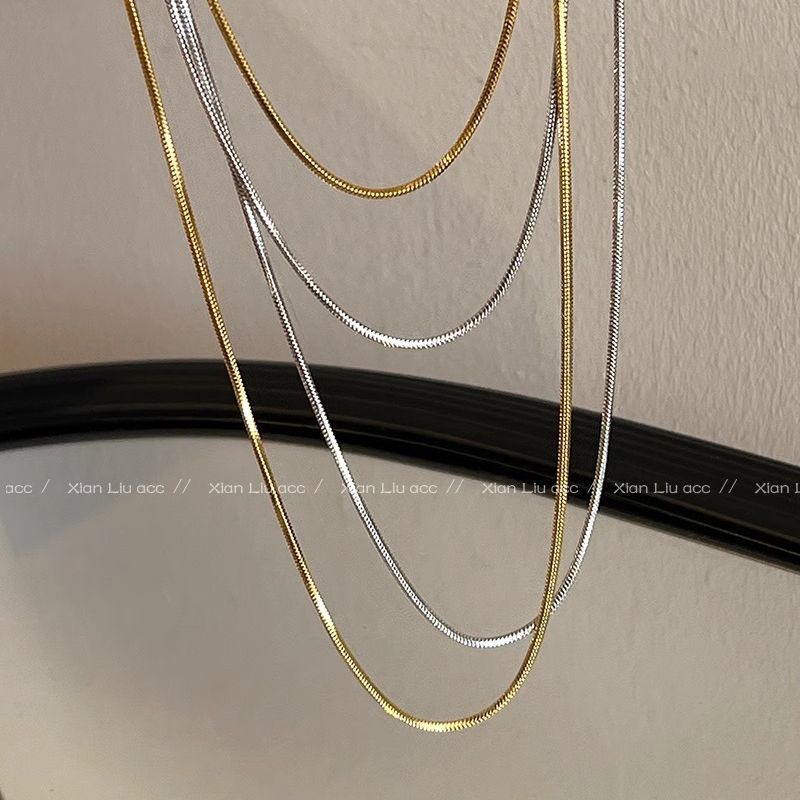 A long, layered golden snake bone chain and plain chain necklace with a simple and elegant style. It's a trendy and versatile sweater chain for women Specification drawing
