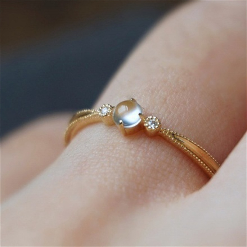Japanese-style white moonlight ring, women's moonlight stone egg surface open index finger ring, retro artistic light luxury high-end ring jewelry Specification drawing