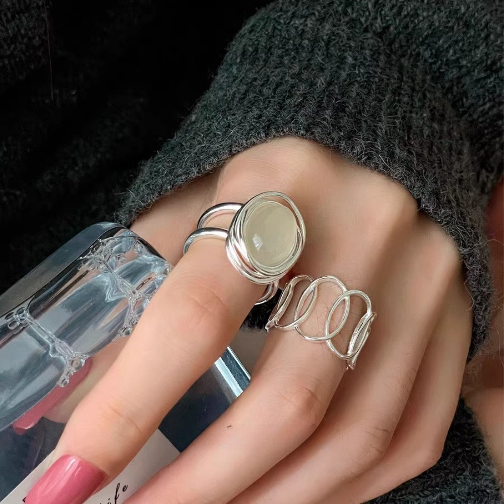 The "White Moonlight of the World" egg white stone Pigeon egg 925 sterling silver ring is a simple and unique women's ring jewelry with hollowed-out lines Specification drawing