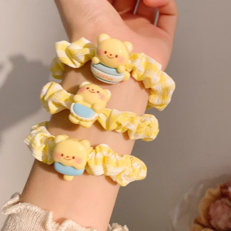 Cute cartoon bear hair band for girls, sweet and childlike, student headband, girlish heart, versatile, small intestine band, no damage to hair, elastic band Application Scenario