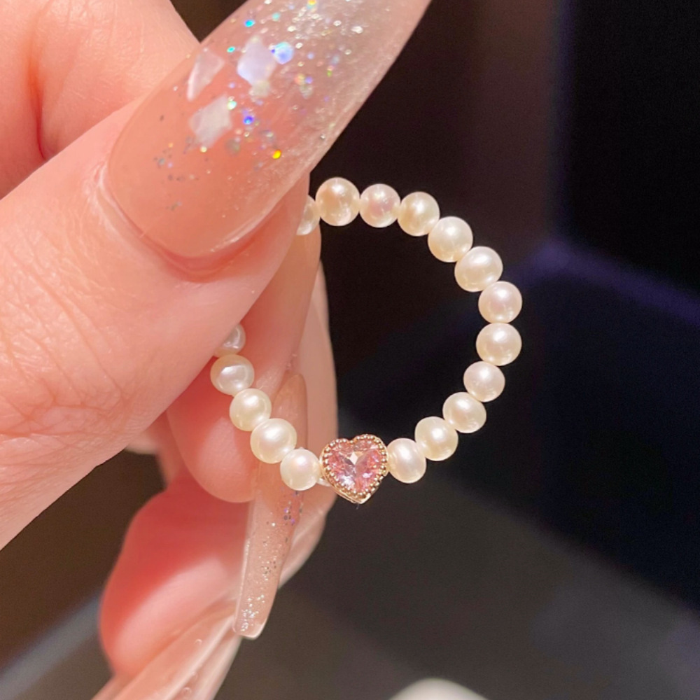 A pink heart-shaped zircon pearl ring for a runaway princess, a rare and high-end index finger ring for women, with a sweet and versatile temperament Specification drawing