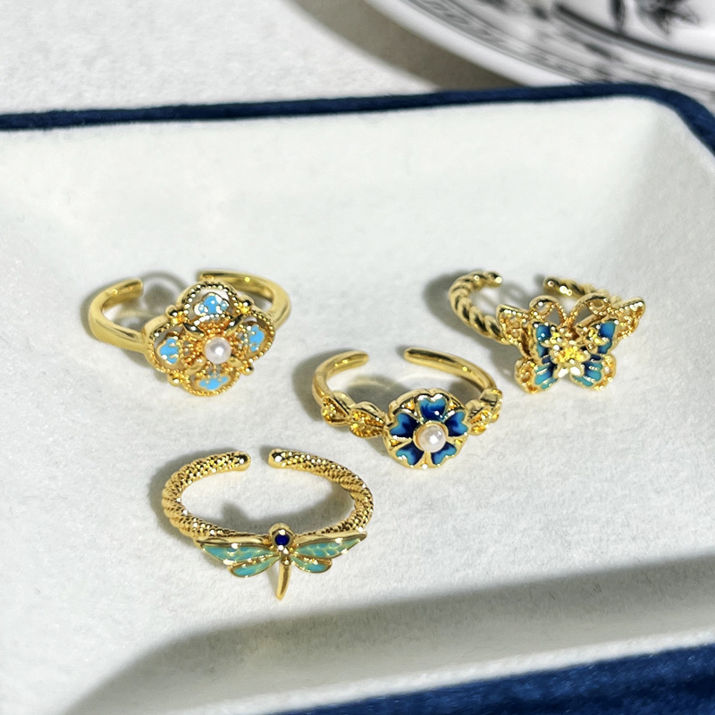 Ancient-style hollowed-out gradient enamel butterfly and dragonfly niche ring for women, with a cold and unique style, retro flower fashion ring Application Scenario