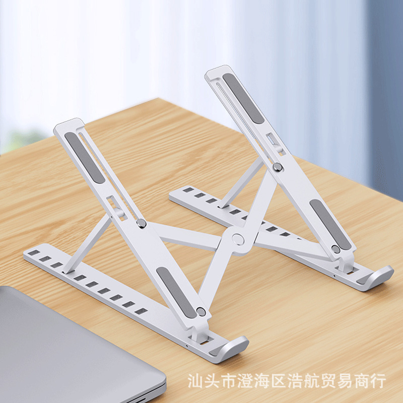 A foldable, open and hollowed-out portable tablet stand for lazy people full figure
