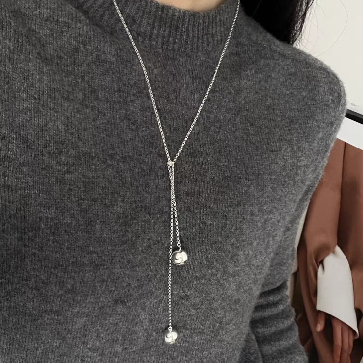 A minimalist double-round long necklace and waist chain for women, with a unique and fashionable look, is a versatile necklace and sweater chain details Picture