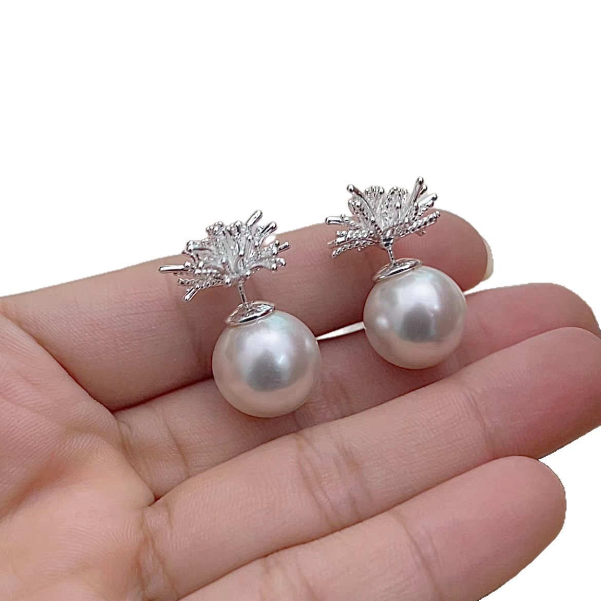 A pair of silver firework pearl stud earrings, a new 2025 bestseller for women, exudes a sense of high-end luxury and elegance Item Picture