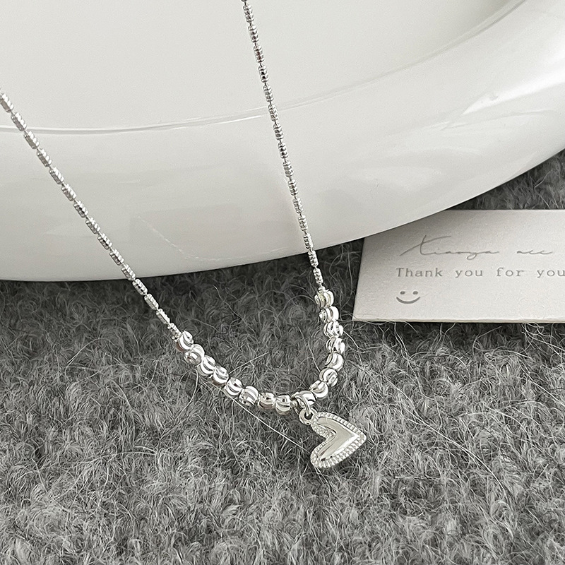 Extremely fine silver heart-shaped pendant necklace, a light luxury and niche accessory for women, collarbone chain, French style sweater chain decoration details Picture