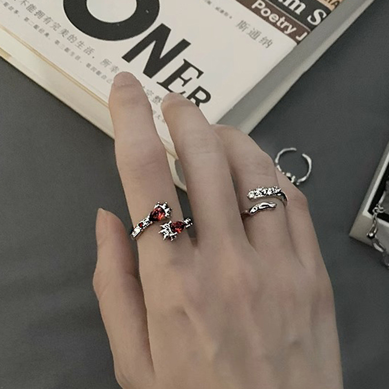The new, elegant and high-end, niche design of the red zircon open ring is a fashionable and cool ring trend for women full figure