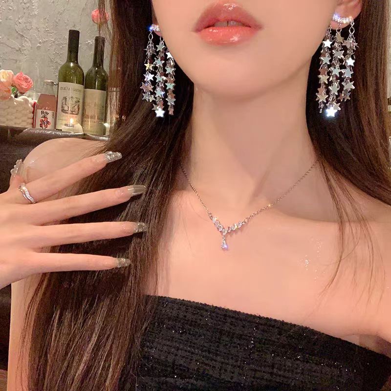 The 2025 new trendy sequined five-pointed star earrings for women, long tassels, elegant and light luxury, super fairy-like, internet-famous stud earrings details Picture