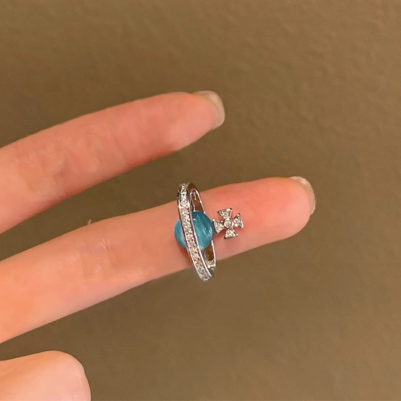 Three-dimensional Saturn sea blue cat's eye open ring for women, a niche design on Instagram, with a high-end and exquisite stacked ring Application Scenario