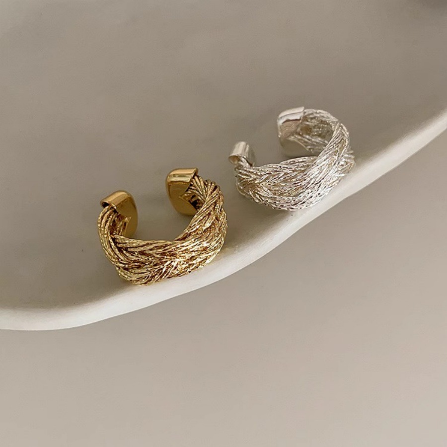 A retro woven and wrapped twisted wide open ring with a unique, simple and cold design for women full figure