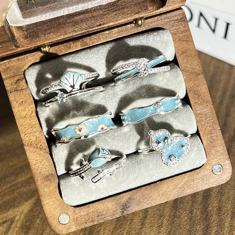 A dreamy ocean-style blue glazed gourd flower open ring with a cold and unique design sense for women's daily life Application Scenario