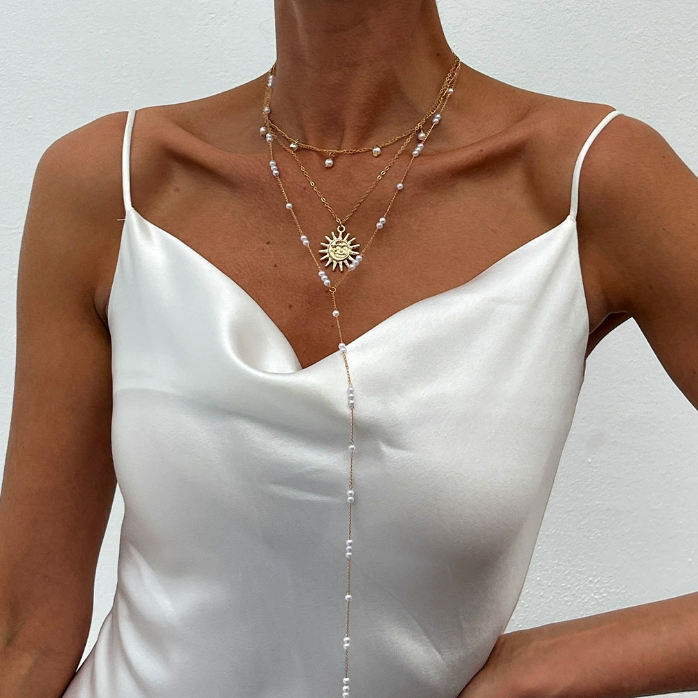 European and American cross-border jewelry ins Sun alloy pendant collarbone chain French style pearl beaded long necklace full figure