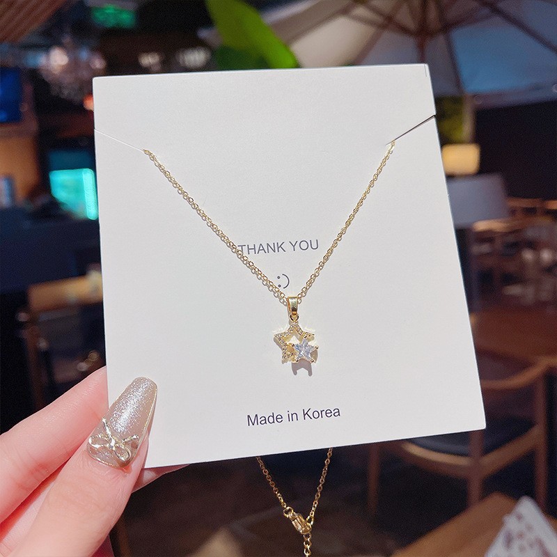 Titanium steel real gold electroplated five-pointed star necklace, versatile design sense, wishing star pendant, fashionable and elegant, star collarbone chain Application Scenario