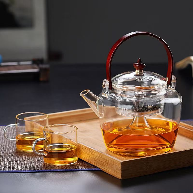 Thickened glass steaming and boiling teapot, high borosilicate boiling kettle, high-temperature resistant electric ceramic stove, tea-boiling handle teapot, tea set teapot full figure