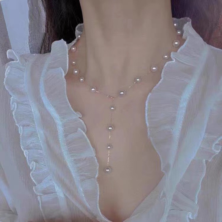 "Starry Sky pearl beaded necklace, gentle Y-shaped fairy sweater chain, long style, niche hoodie chain wholesale. full figure