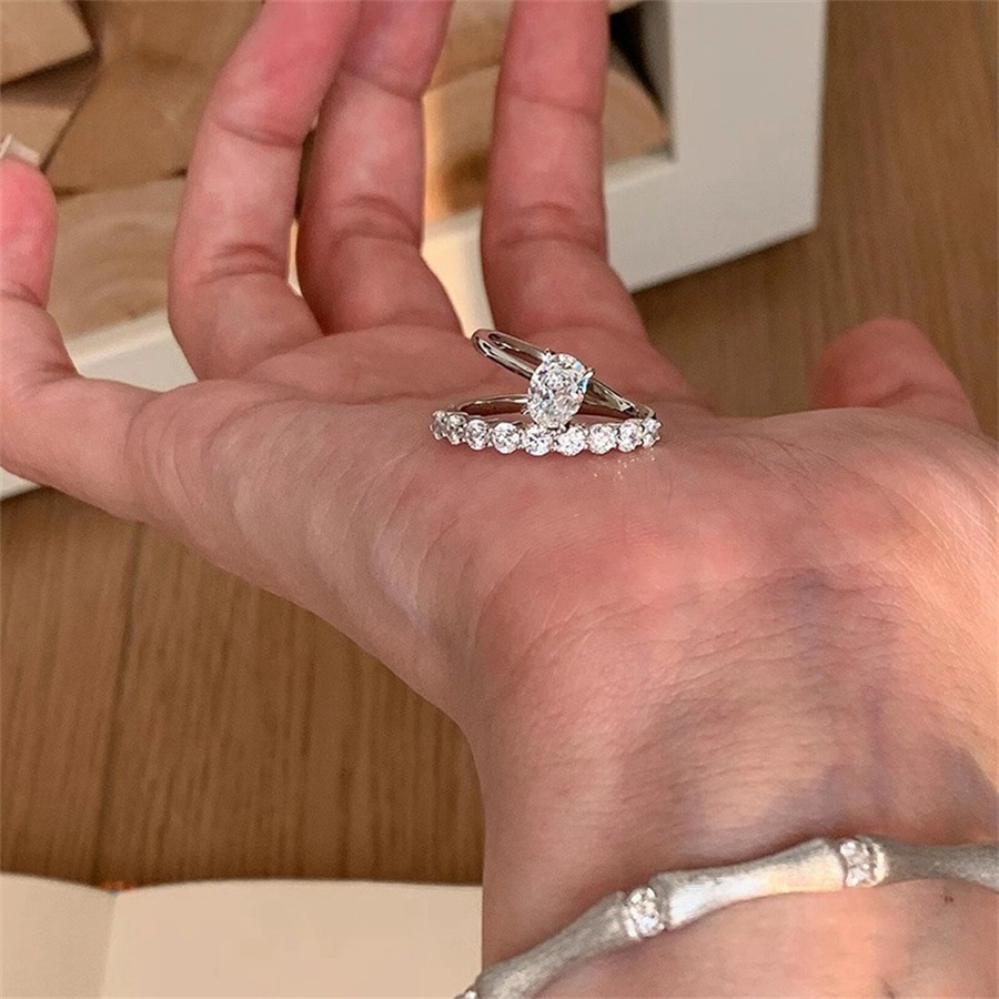 Exquisite super sparkling micro-inlaid pigeon egg zircon ring for women, s925 silver, light luxury, high-end and elegant, versatile row diamond ring full figure