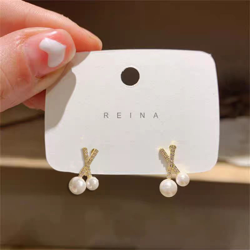 Cross-zircon pearl stud earrings 2025 New bestseller Exquisite earrings, women's niche design sense light luxury fashion earrings full figure