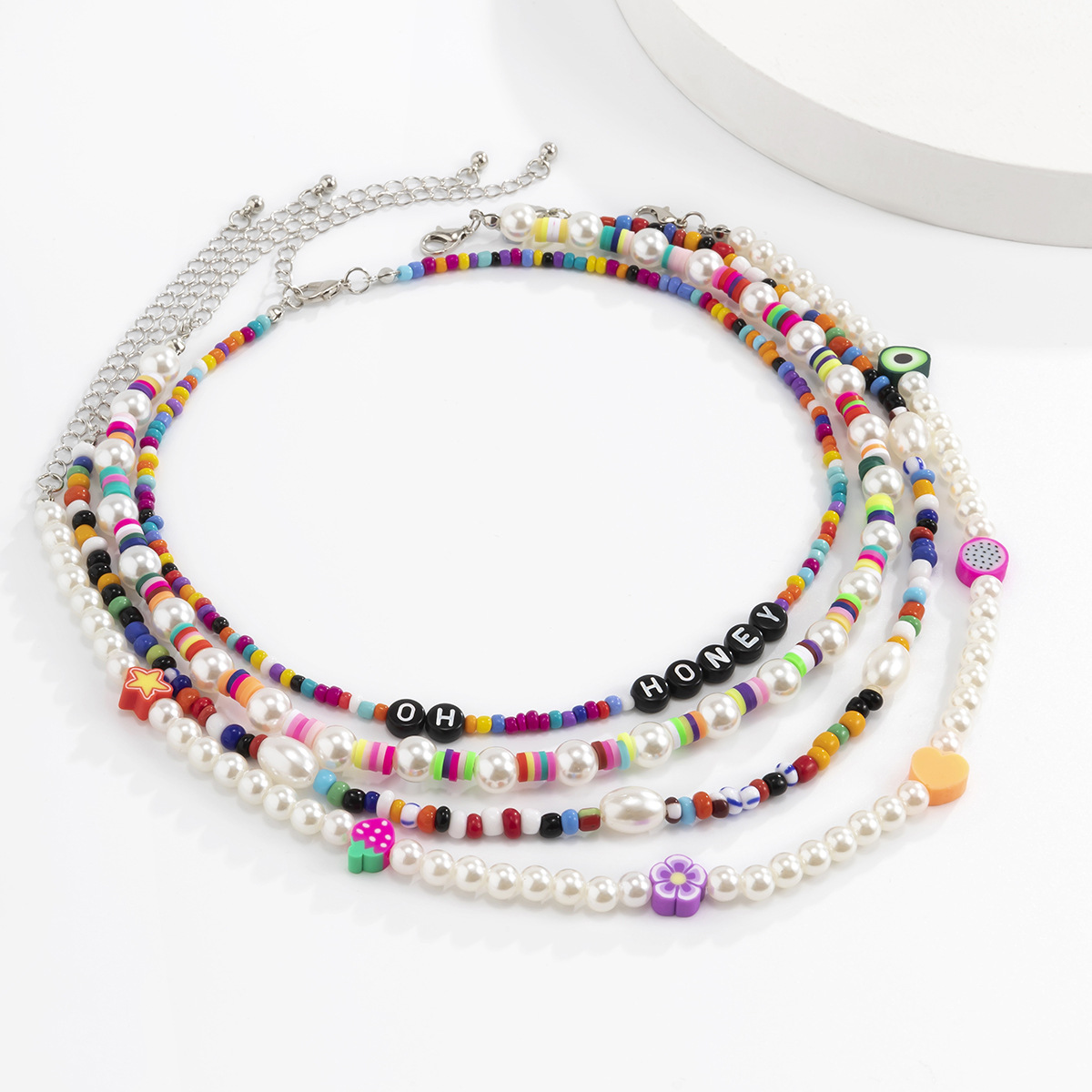 European and American cross-border jewelry, Bohemian mixed-color beaded soft clay necklace, retro imitation pearl heart-shaped letter necklace details Picture