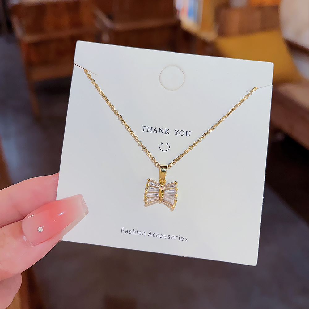 Niche design necklace, ins sweet and elegant bow titanium steel necklace, women's high-end feel, super dazzling light luxury collarbone chain details Picture