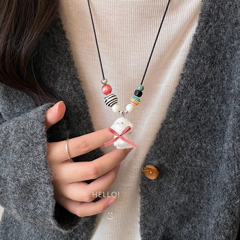 Dopamine cute plush puppy pull-out necklace, a versatile sweater chain for sweet girls, and a unique and fun necklace for children Application Scenario