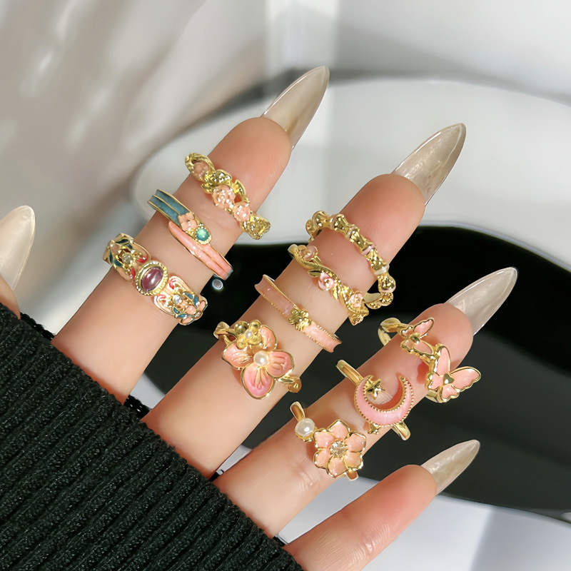 Korean sweet pink enamel flower drop glaze elegant open ring, a fashionable and niche design sense light luxury ring for women details Picture