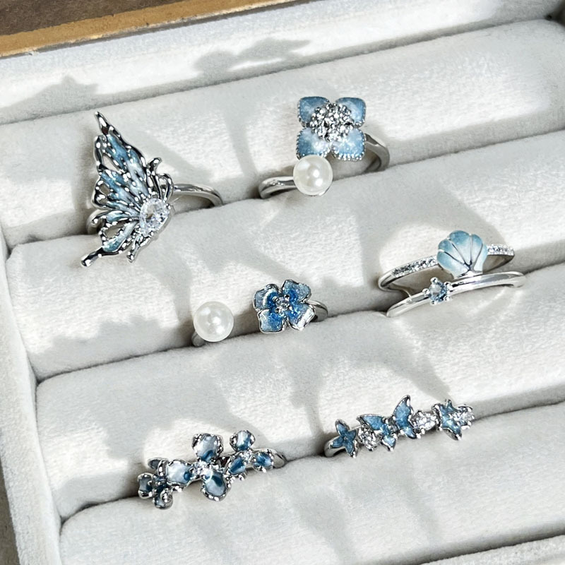 A niche, cool, sea blue gradient butterfly flower open ring for women with pearl fashion layering, a light luxury ring Specification drawing