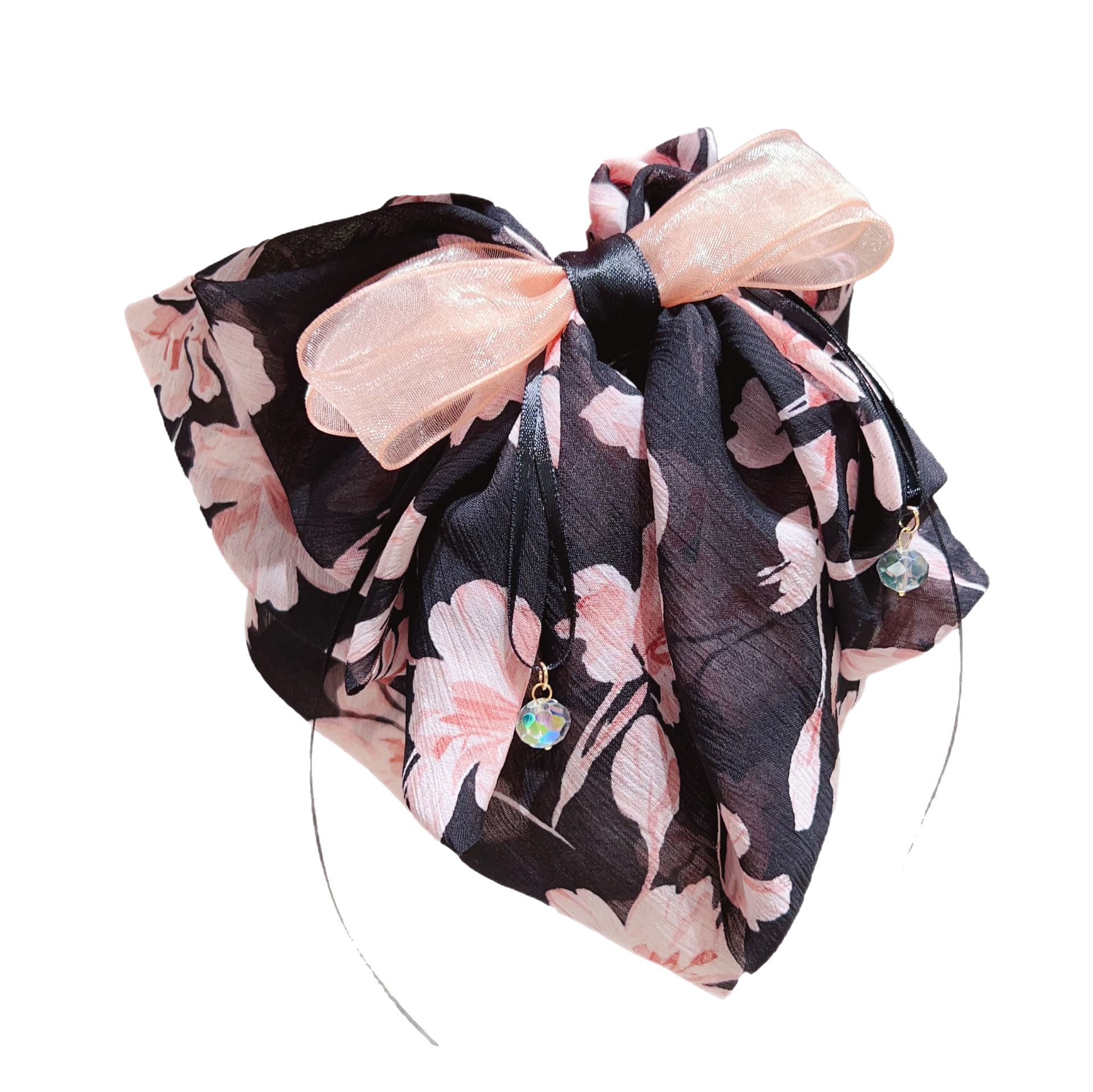 A new, elegant and sweet bow floral grabber with a gentle and refined style. It features a small ponytail at the back and a shark clip hair accessory Item Picture