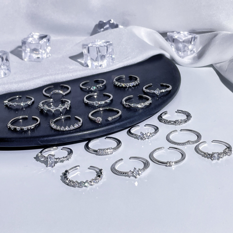 The ring is a niche design for women, with a simple and individual style. It features a fine circle of zircon with an open ring, exuding a cold and elegant vibe. It is a trendy index finger ring with a layered design Specification drawing