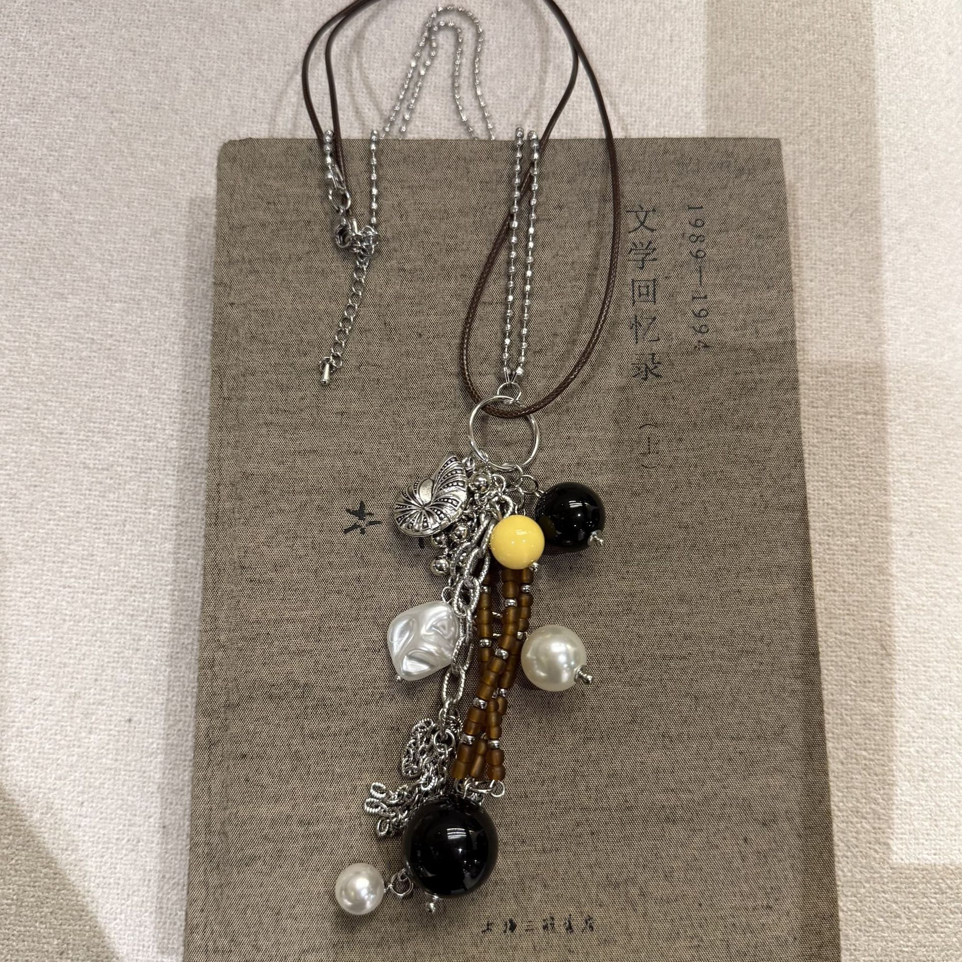 Utopia Series Metal conch tassel long necklace, niche design pearl sweater chain, versatile double-layer necklace details Picture