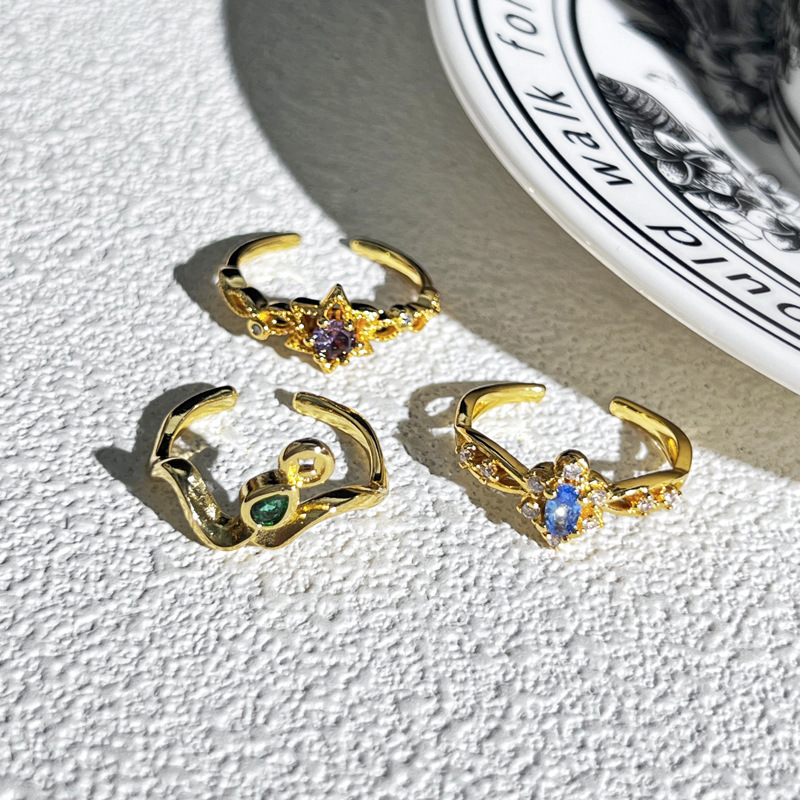 A small open ring with a court style starlight purple diamond, simple and elegant, and a retro, sweet and cool, versatile ring accessory made of sea blue zircon Specification drawing