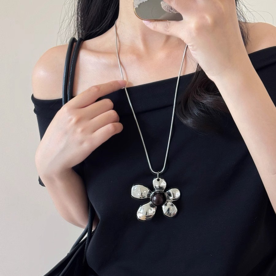 Korean retro, aged, mottled silver flower pendant, exaggerated and fashionable ins long necklace, sweater chain for women details Picture