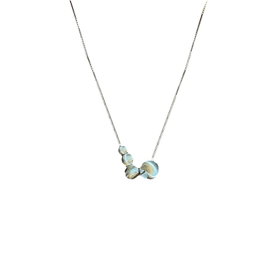 This Korean brushed and frosted ball necklace features a niche design for women, a simple and versatile collarbone chain with a cold style Item Picture