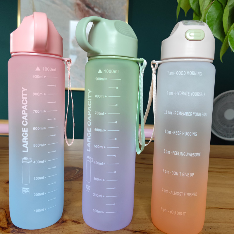 New wholesale simple gradient matte plastic water cup with a suction nozzle, portable handle, adult outdoor sports water bottle details Picture