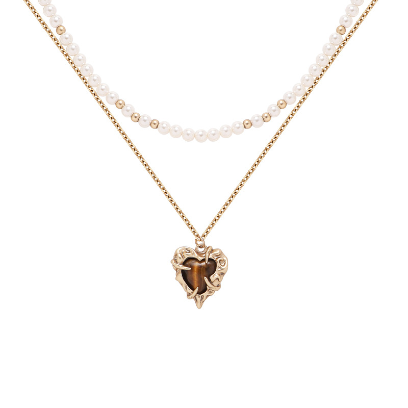 Autumn and winter tiger's eye heart-shaped pearl necklace for women, double-layered wearing, high-end golden collarbone chain, fashionable and niche pendant Item Picture