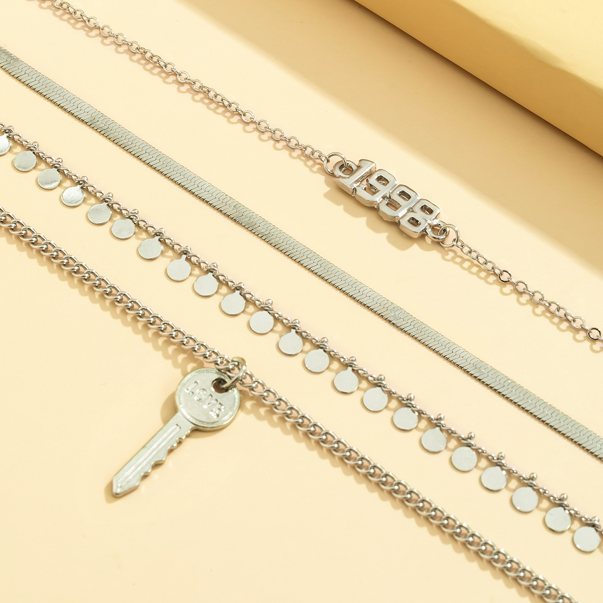 Retro letter key sequin tassel necklace for women, punk geometric snake bone chain necklace, cross-border accessories from Europe and America Application Scenario