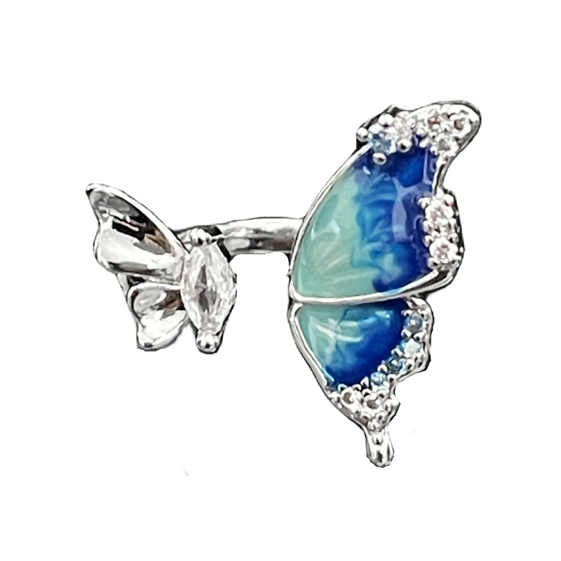 Amazon's unique ice blue gradient colored drip glaze butterfly ring is a versatile and sweet, cool, and unique food ring for women's cold style Item Picture