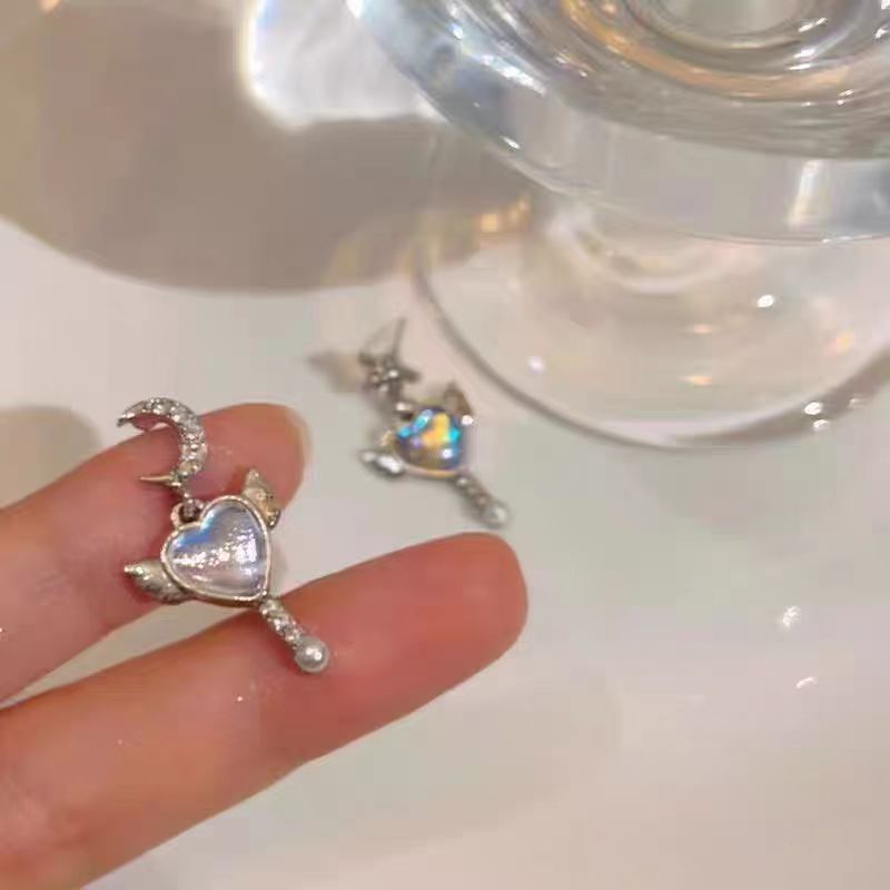 Iridescent heart Angel Wing ear studs Star Moon Asymmetrical ins water style Niche design high-end earrings Application Scenario